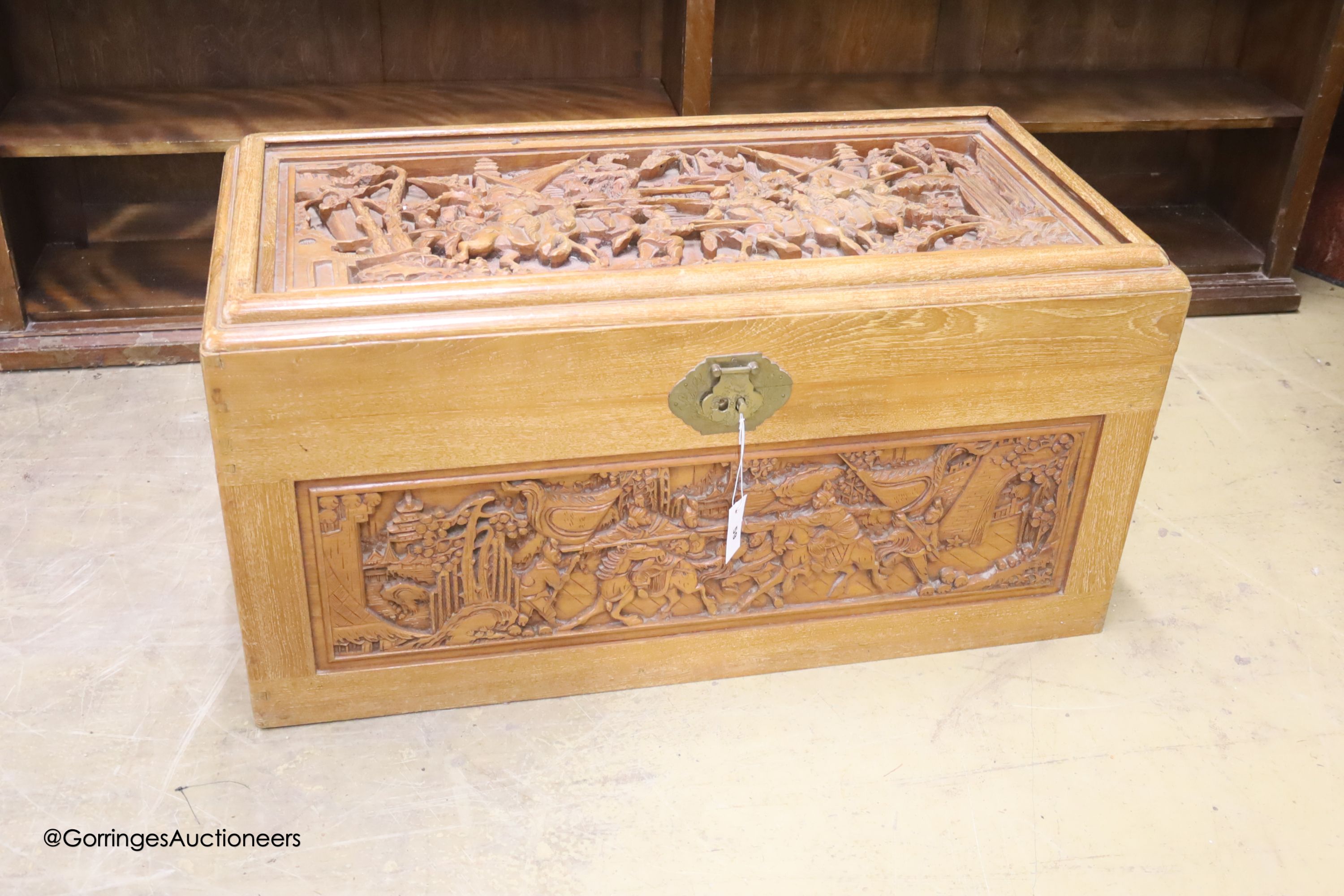 A Chinese carved camphorwood chest, length 100cm, depth 50cm, height 50cm